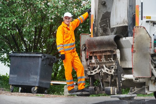 Business with clearly labelled recycling stations for staff